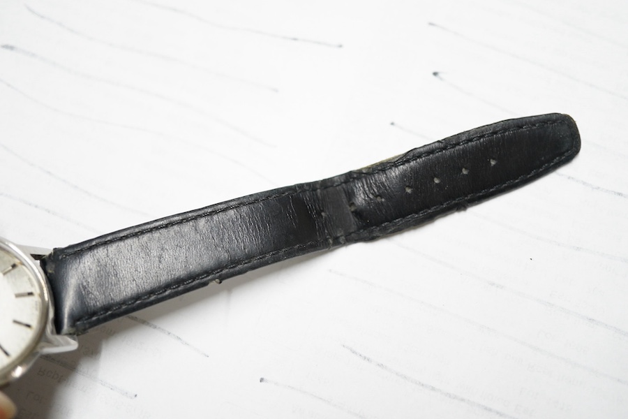 A gentleman's 1960's? stainless steel Omega Automatic wrist watch, with baton numerals and date aperture, case diameter 35mm, on an associated strap, no box or papers.